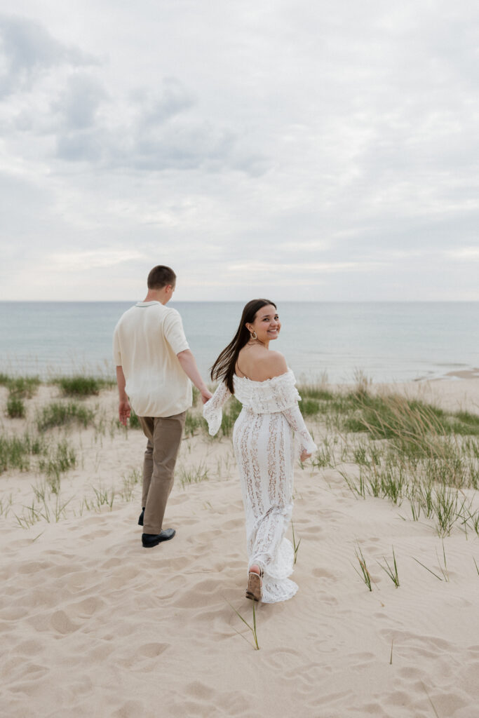timeless beach engagement session white dress